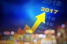 QBE reveals profit surge and executive reshuffle